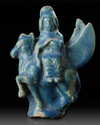 A SEATED FIGURINE ON A FLYING ANIMAL, RAQQA, SYRIA, 12TH-13TH CENTURY