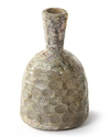 A HONEYCOMB FACETED WHEEL-CUT GLASS BOTTLE, PERSIA, CIRCA 10TH CENTURY