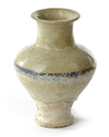 A RAQQA BLUE AND WHITE POTTERY JAR, SYRIA, 13TH CENTURY