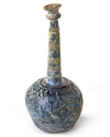 A TALL-NECKED BLUE GLASS BOTTLE, PERSIA OR SYRIA, 11TH-12TH CENTURY