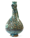 A RARE FRITWARE OPENWORK DECORATED RETICULATED EWER WITH ROOSTER HEAD, PERSIA, 13TH CENTURY