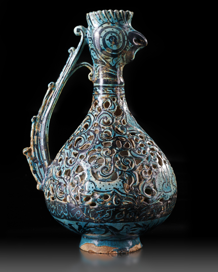 A RARE FRITWARE OPENWORK DECORATED RETICULATED EWER WITH ROOSTER HEAD ...