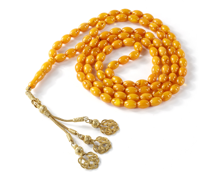 AN OTTOMAN AMBER PRAYER BEADS, TISBIH ) 19TH-20TH CENTURY