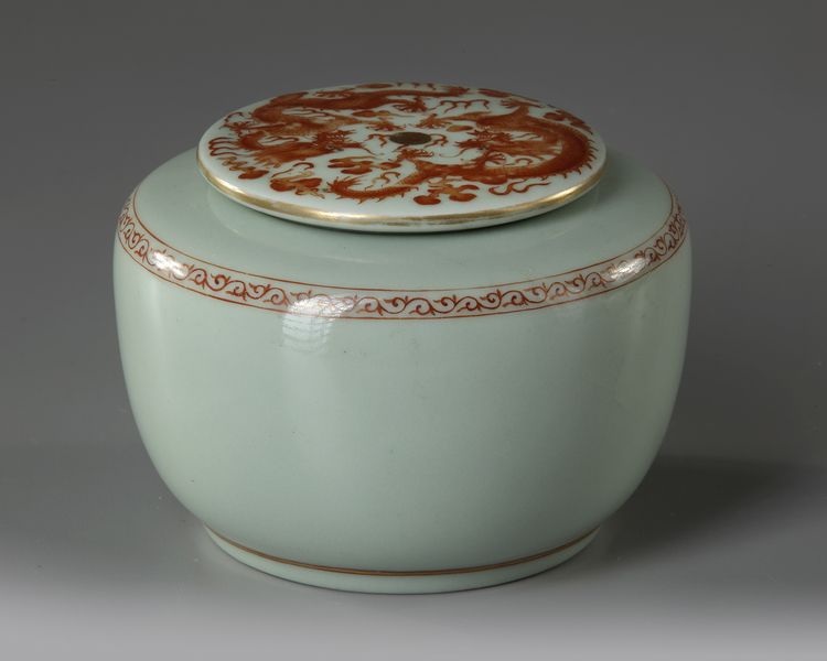 A CHINESE CELADON GLAZED DECORATED DRAGON' WATERPOT WITH COVER