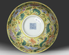 A CHINESE YELLOW-GROUND FAMILLE ROSE BOWL, QING DYNASTY (1644-1911)
