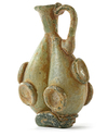 AN EARLY ISLAMIC GLASS FLASK, NEAR EAST, CIRCA 8TH-10TH CENTURY