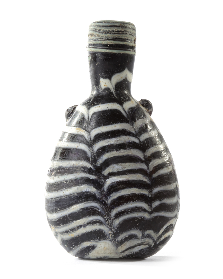 AN ELEGANT AYYUBID OR EARLY MAMLUK MARVERED GLASS JAR, EGYPT OR SYRIA, 12TH-13TH CENTURY