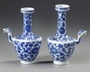 A PAIR OF BLUE AND WHITE EWERS, KANGXI PERIOD (1662-1722 )