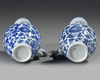 A PAIR OF BLUE AND WHITE EWERS, KANGXI PERIOD (1662-1722 )