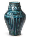 A FINE KASHAN SILHOUETTE-WARE POTTERY VASE,  PERSIA, LATE 12TH CENTURY