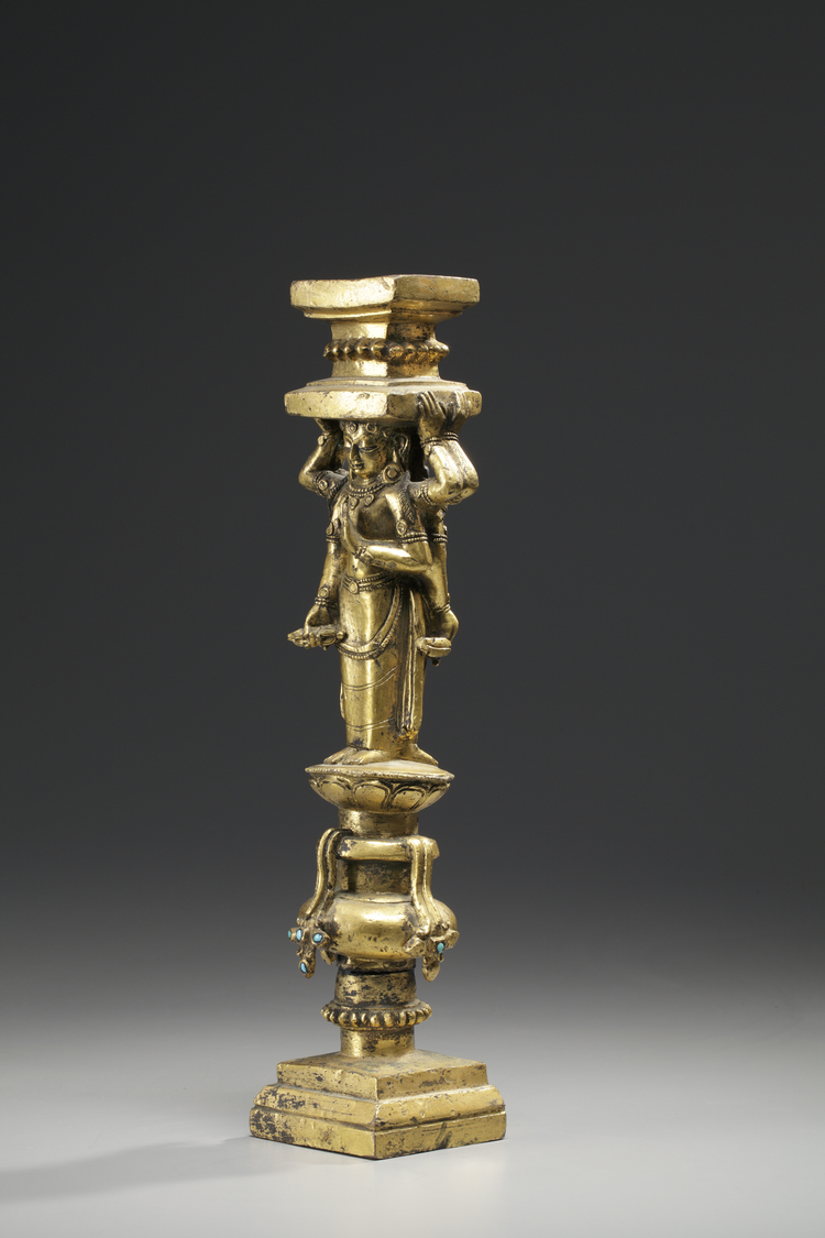 A gilt bronze support with two Deities