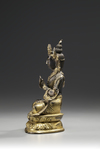 A gilt bronze figure of Manjusri