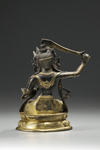 A gilt bronze figure of Manjusri