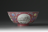 A famille rose ruby-ground medallion bowl