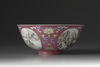 A famille rose ruby-ground medallion bowl