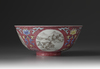 A famille rose ruby-ground medallion bowl