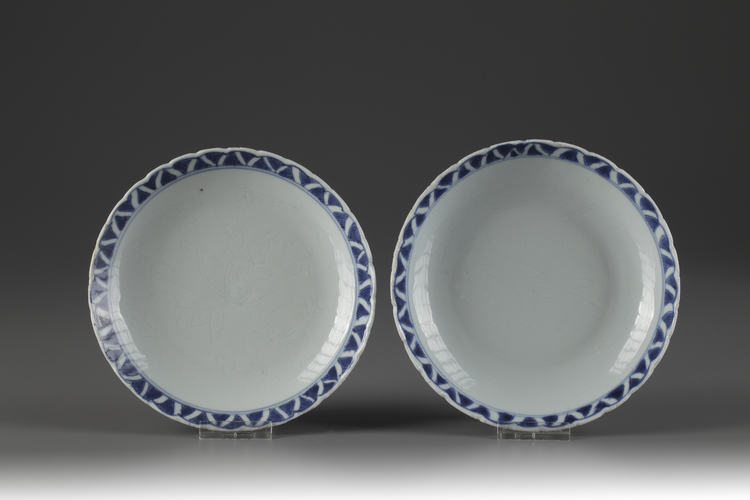 A near pair of blue and white dishes