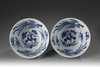 A pair of blue and white 'dragon and phoenix' bowls