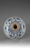 A blue and white stem cup