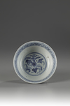 A blue and white stem cup