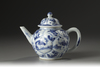 A blue and white moulded 'boys' teapot