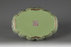 An inscribed and dated lime-green ground famille rose tea tray