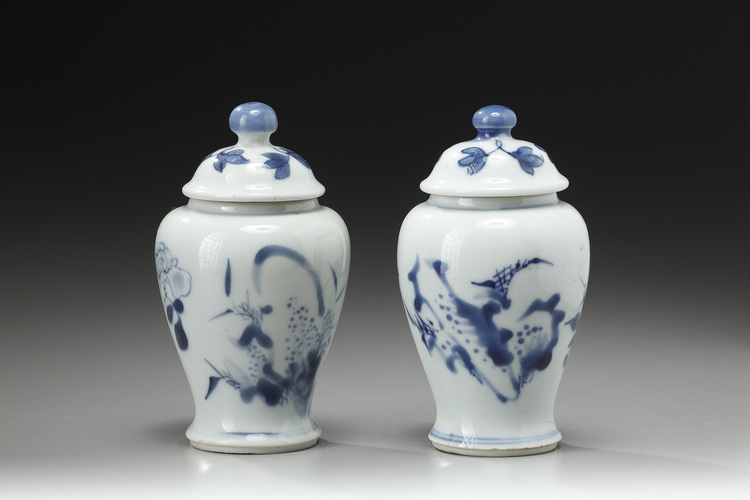 A Pair of Small Vases with Covers