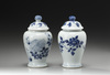 A Pair of Small Vases with Covers