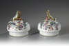 A pair of large Chinese famille rose baluster vases and covers