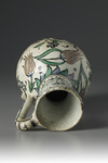 An Iznik pottery jug