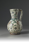 An Iznik pottery jug