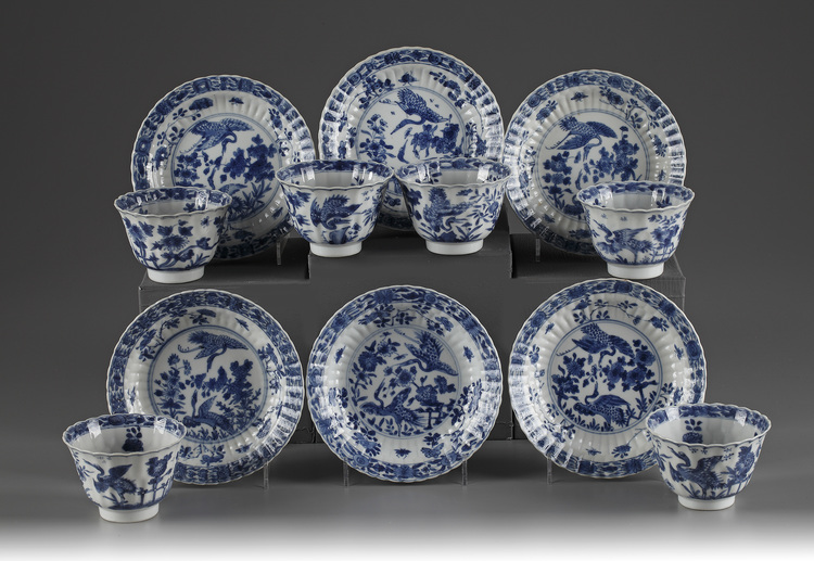 Six sets of blue and white cups and saucers