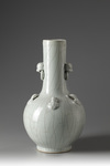 A large pale turquoise crackle-glazed bottle vase