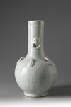 A large pale turquoise crackle-glazed bottle vase