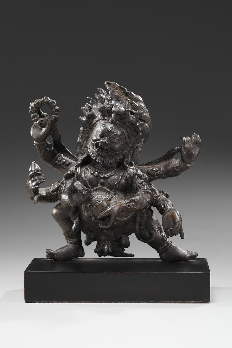A Sino-Tibetan bronze figure of six-armed Mahakala
