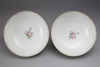 A pair of Lowestoft punch-bowls