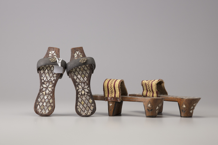 Two pairs of mother-of-pearl inlaid wooden hammam shoes
