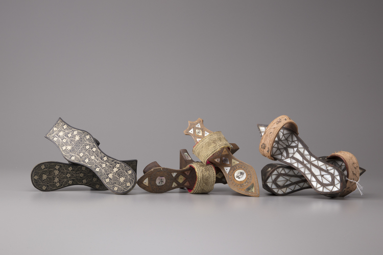 Three pairs of mother-of-pearl inlaid wooden hammam shoes