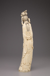 An ivory figure of a standing lady