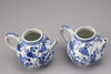 A pair of blue and white porcelain teapots
