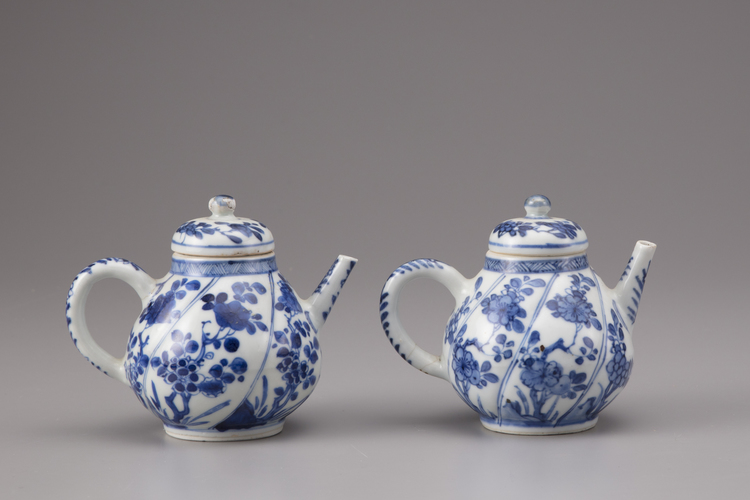 A pair of blue and white porcelain teapots