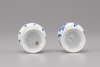 A pair of blue and white porcelain pounces