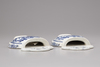 A pair of blue and white porcelain wall vases