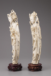 A pair of ivory standing figures of Meiren