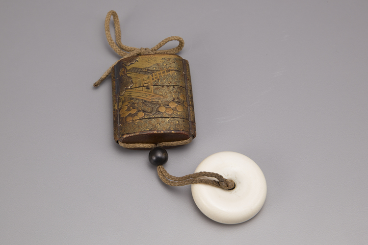 A Japanese four-case lacquered and gilded inro
