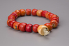 A blood coral prayer bead necklace