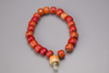 A blood coral prayer bead necklace