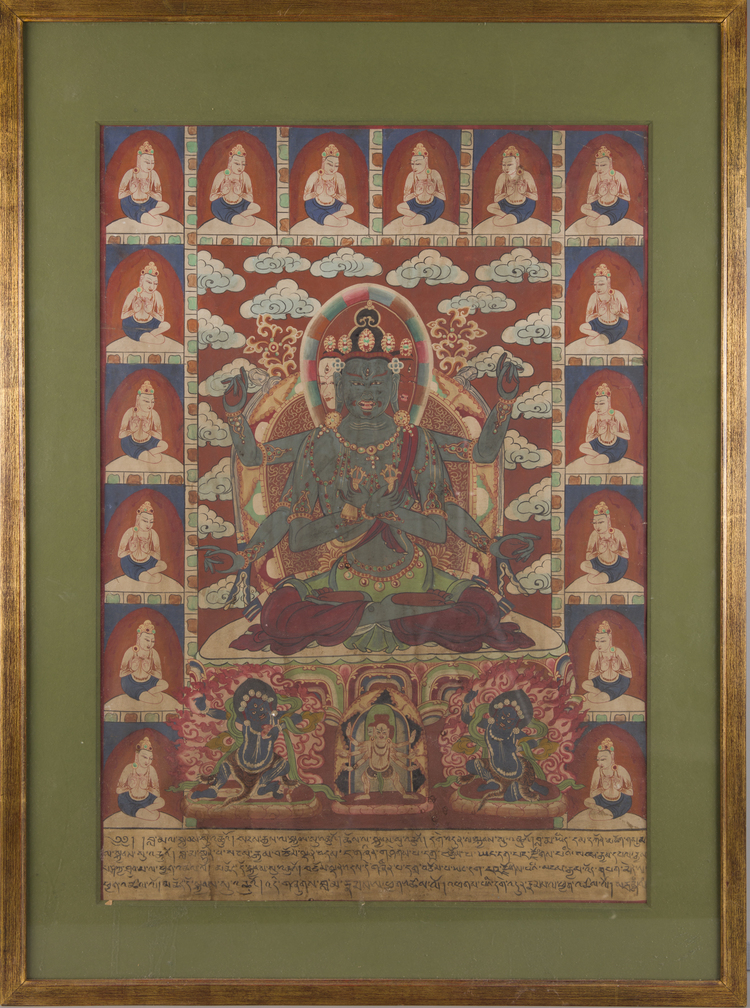 A framed Tibetan Thangka