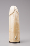 A carved ivory phallus