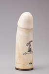 A carved ivory phallus
